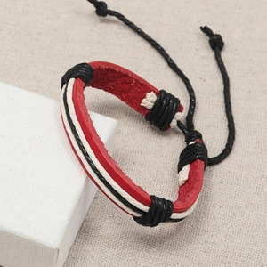 Multilayer handmade red leather bracelet with woven black and white cord accents