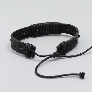 Handmade black woven leather bracelet with adjustable drawstring closure and retro punk style