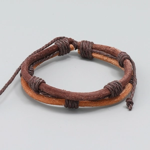 Handmade multilayer braided leather bracelet featuring vintage brown tones and woven textures