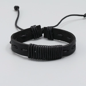 Handmade black woven leather bracelet with vintage punk style and adjustable pull cord