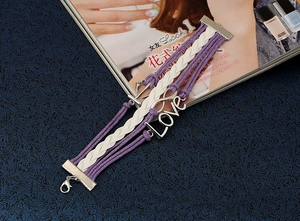 Detail of multi-layer purple braided PU leather bracelet with Love and Infinity charms