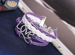 Detail view of multi-layer PU leather bracelet with Love and Infinity alloy charms