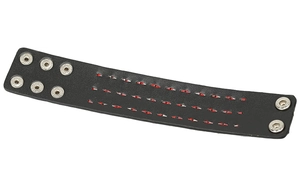 Detail view of adjustable metal snap fasteners on a black punk leather wristband
