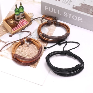 Bracciale multistrato vintage in pelle intrecciata nera e marrone con cordino regolabile