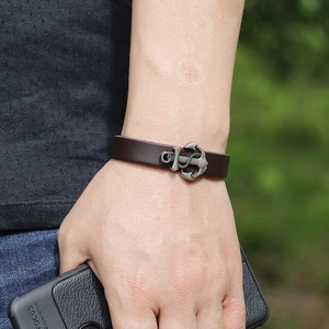 Adjustable brown leather bracelet featuring a vintage silver anchor charm for men and women