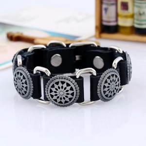 Punk style black leather bracelet with silver sunflower studs and snap button closure