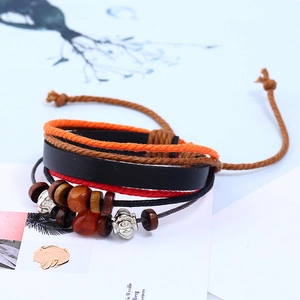 Bohemian multilayer woven leather bracelet with wooden beads and silver metal charms