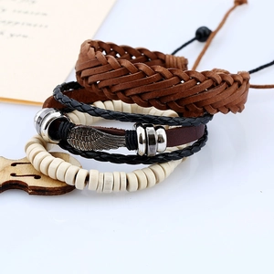 Three-piece set of vintage braided leather bracelets with silver metal wing charm