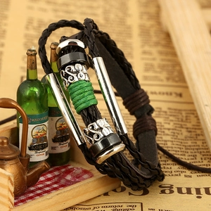 Multilayer retro braided leather bracelet with silver beads and green string focal point