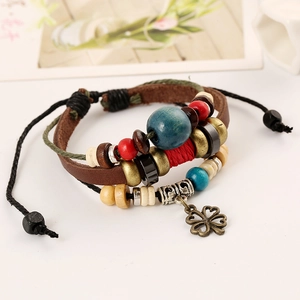 Multilayer leather bracelet with colorful wooden beads and a bronze clover leaf charm