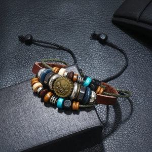 Bracciale multistrato in pelle da uomo con perline teschio e ciondolo a chiave inglese