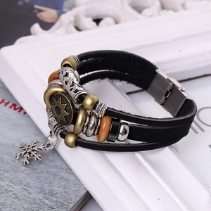 Retro multilayer leather bracelet with bronze sun medallion and snowflake charms