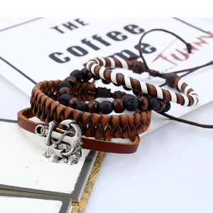 Set of 4 vintage leather bracelets featuring lava stones, wood beads, and an anchor charm