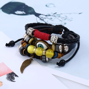 Ensemble bracelet multicouche en cuir avec perle mauvais œil et breloque aile en bronze