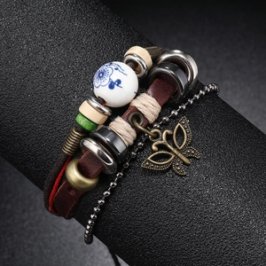 Handmade multilayer leather bracelet with butterfly pendant and vintage ceramic bead