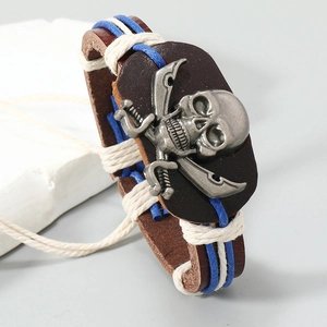 Retro handmade braided leather pirate bracelet with silver skull and crossbone design