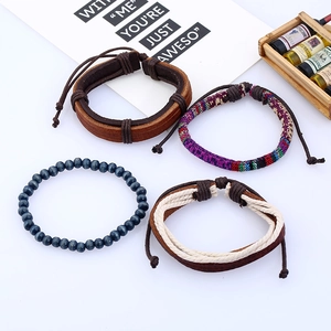 Adjustable 4-piece set of handmade leather bracelets with ethnic weaving and wooden beads