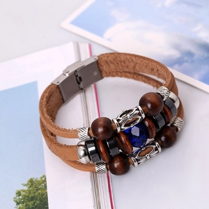 Multilayer vintage leather bracelet with brown wooden beads and blue crystal center