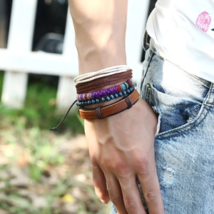 Handmade woven multilayer leather bracelet set with ethnic beads in bohemian style