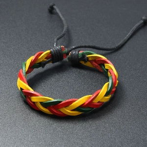 Detail of red, yellow, and green woven leather bracelet with adjustable black cord string