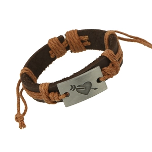 Retro leather woven bracelet featuring a vintage alloy heart and arrow plaque pendant