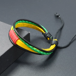 Braided leather Rasta bracelet with adjustable red yellow and green multilayer cords