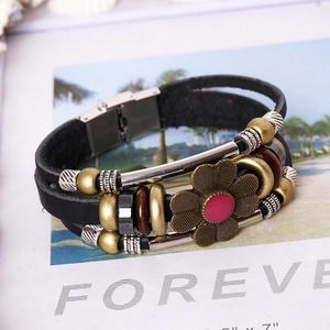 Handmade multilayer leather bracelet with bronze flower charm and stainless steel clasp