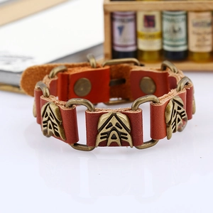Punk style brown leather bracelet with bronze metal buckles and vintage carvings