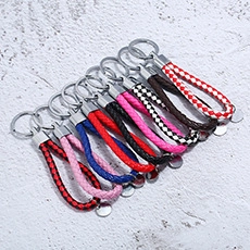 Detailed view of bohemian braided tassel sweater chain in various fashion colors