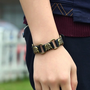 Punk style mens genuine black leather bracelet with bronze metal links and tribal charms