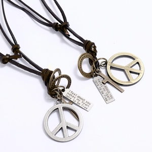 Adjustable cowhide leather necklace featuring vintage peace sign and engraved plaque