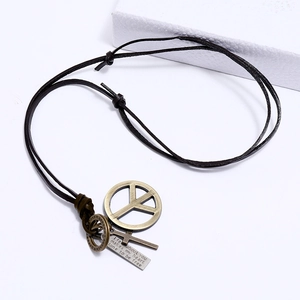 Adjustable brown leather necklace featuring bronze peace sign and cross pendants