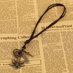 Vintage maple leaf and cross pendant on black leather cord with engraved metal tag