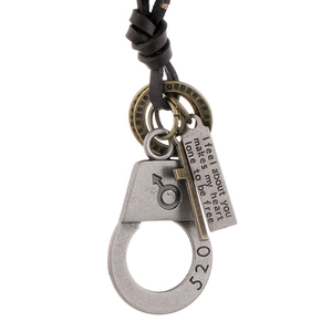 Retro couple's alloy pendant necklace featuring a brown leather cord and 520 handcuffs charms