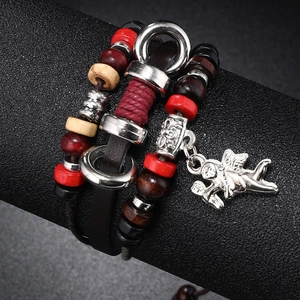 Vintage multi-layer leather bracelet with wooden beads and silver angel wing charm