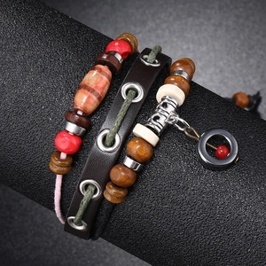 Multilayer leather beaded bracelet set featuring vintage wood beads and metal charms