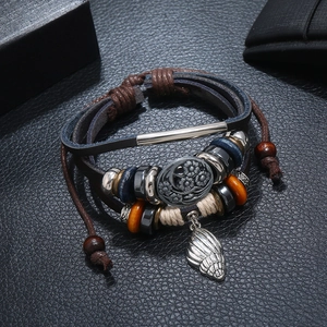 Handmade multilayer leather bracelet with wooden beads and silver conch shell pendant
