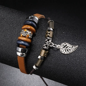 Handmade multilayer leather bracelet set with wooden beads and a metal leaf charm