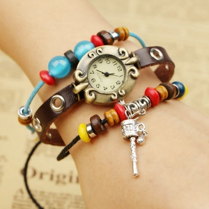 Montre bracelet bohème multicouche en cuir avec perles et cadran rétro en bronze