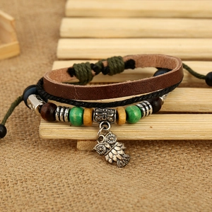 Multilayer leather bracelet featuring vintage owl charm and colorful resin beads