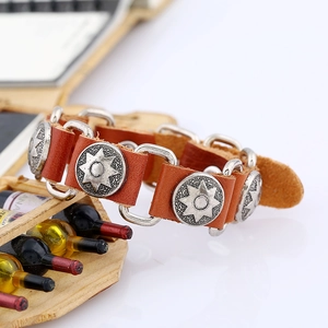 Retro brown leather bracelet with star embossed metal charms and buckle closure