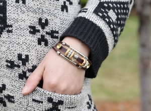 Detailed view of multilayer leather bead bracelet with silver tube and crystal accents