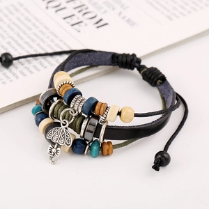 Bohemian multilayer leather bracelet with wooden beads and a small metal umbrella charm