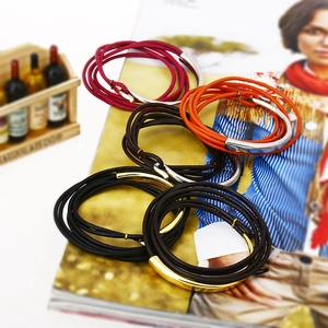 Multilayer leather wrap bracelet with curved metal tube clasp in four assorted colors