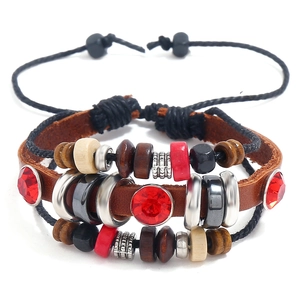 Multilayer bohemian leather bracelet with red crystal beads and handmade braided cords