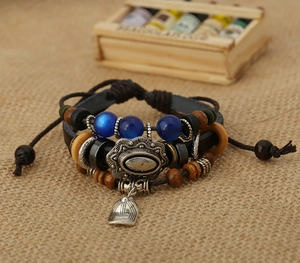 Handmade leather multilayer bracelet with blue cat's eye beads and baseball cap pendant