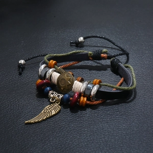 Bohemian multilayer leather bracelet with bronze feather pendant and colorful wood beads