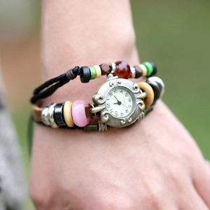 Vintage multilayer leather bracelet watch with wooden beads and silver dial detail