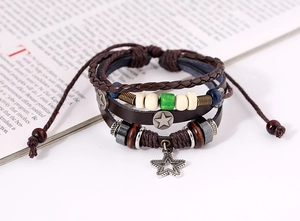 Detailed shot of multilayer leather bracelet with alloy star charms and colorful beads