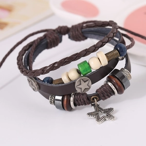 Retro Bohemian multilayer leather bracelet with wooden beads and star charms on white background